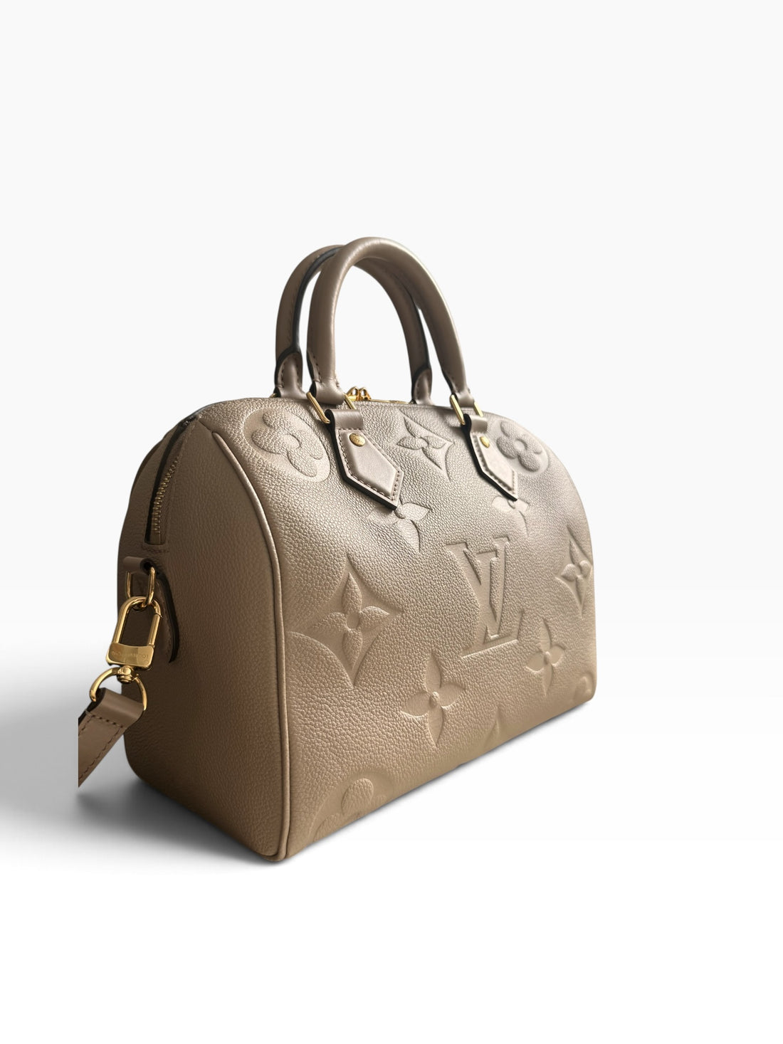 Louis Vuitton Speedy 25 in genarbtem Monogram Empreinte Leder mit einem übergrossen Monogram-Motiv.