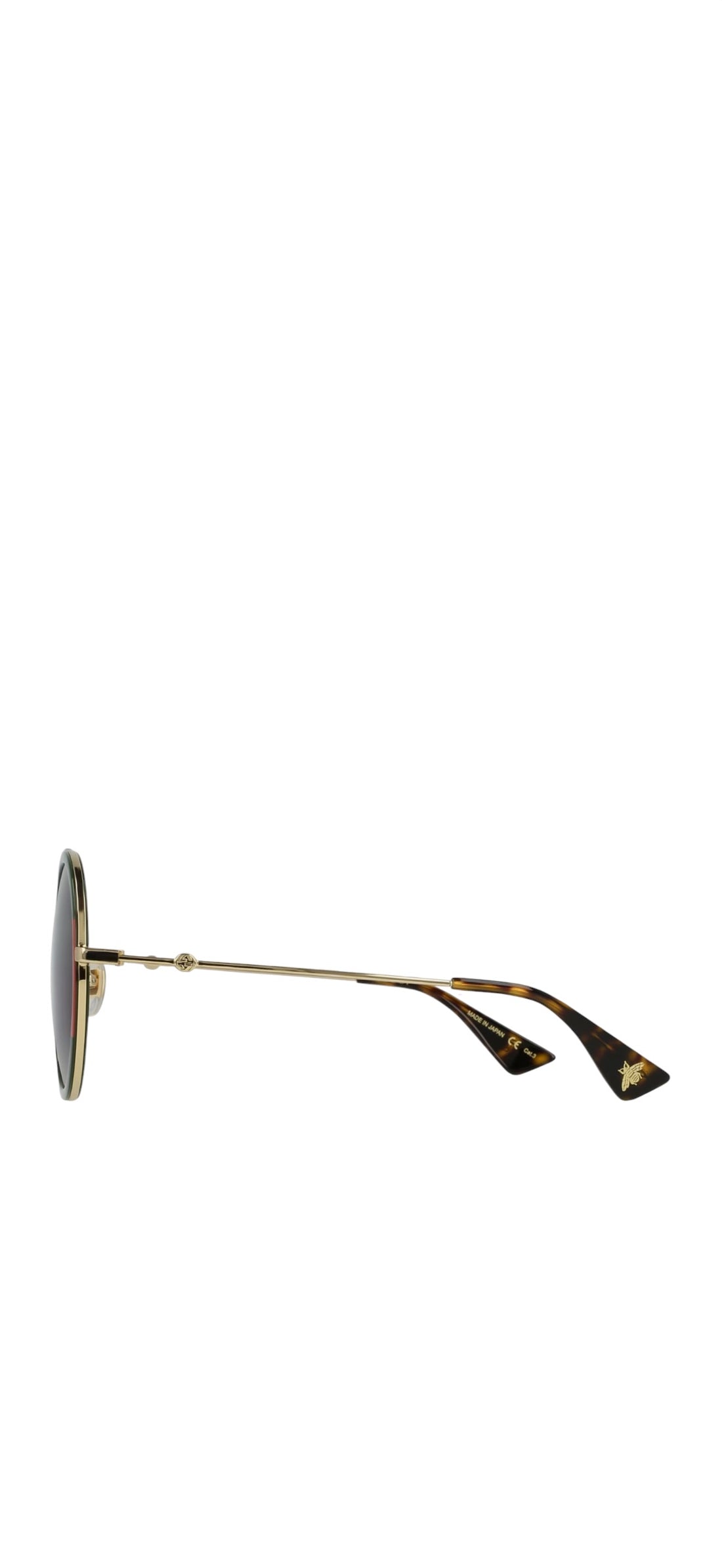Gucci GG0061S Sonnenbrille besticht durch ihren runden Metallrahmen mit den markanten rot-grünen Web-Details und den klassischen Farbverlaufsgläsern.