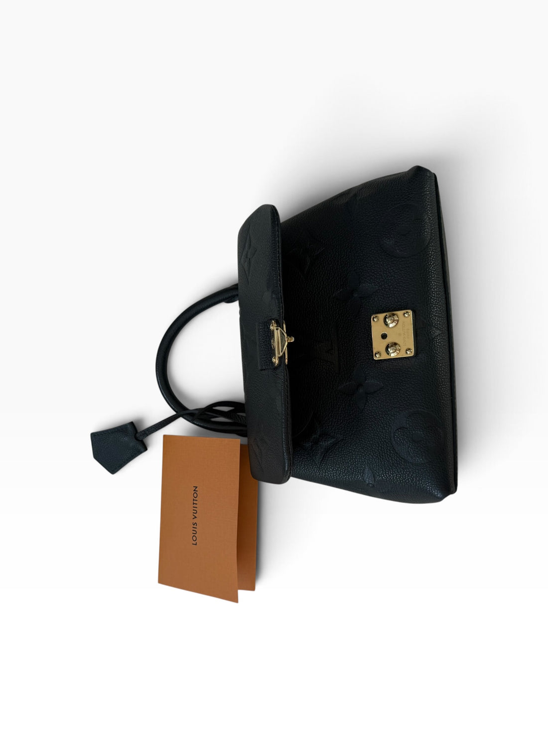 Louis Vuitton Madeleine BB aus schwarzem genarbtem Monogram Empreinte Rindsleder.