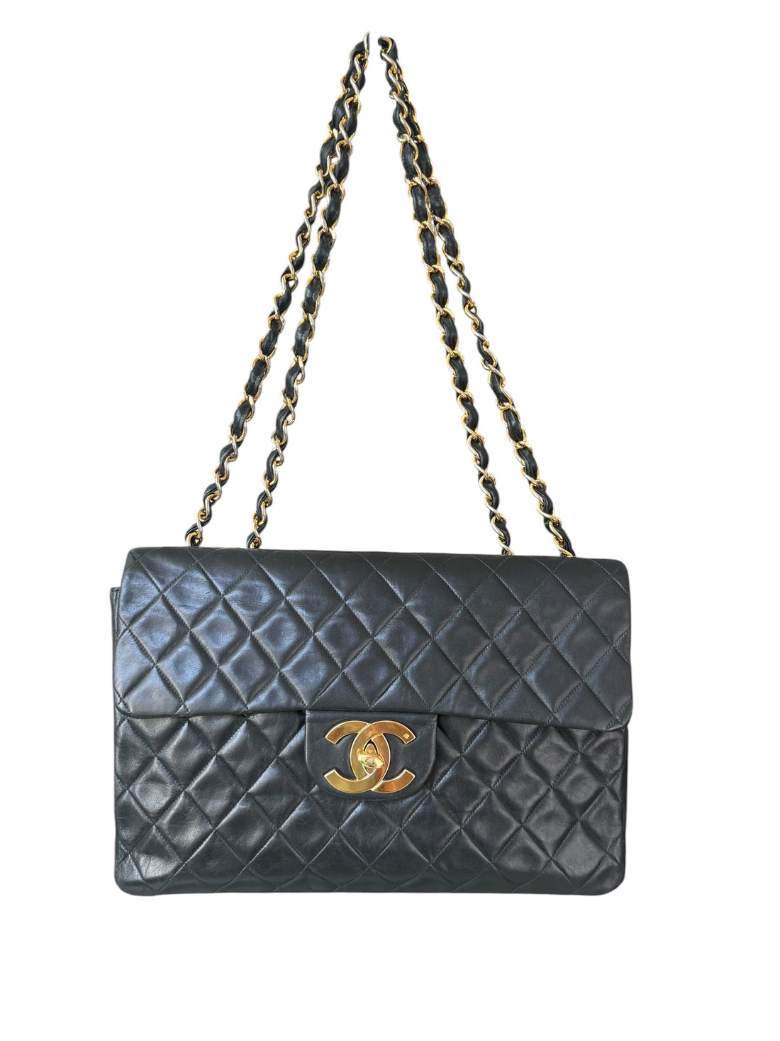 Chanel Classic Flap Bag Maxi Vintage aus schwarzem Lammleder und 24 Karat vergoldeter Hardware.