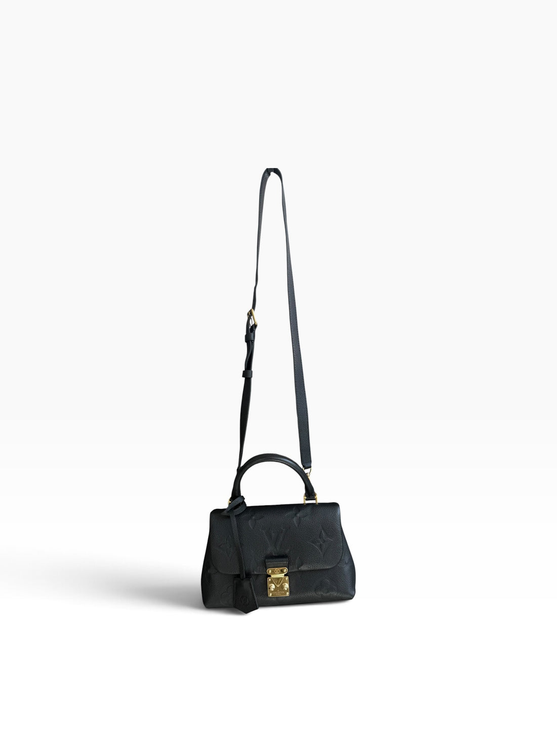 Louis Vuitton Madeleine BB aus schwarzem genarbtem Monogram Empreinte Rindsleder.