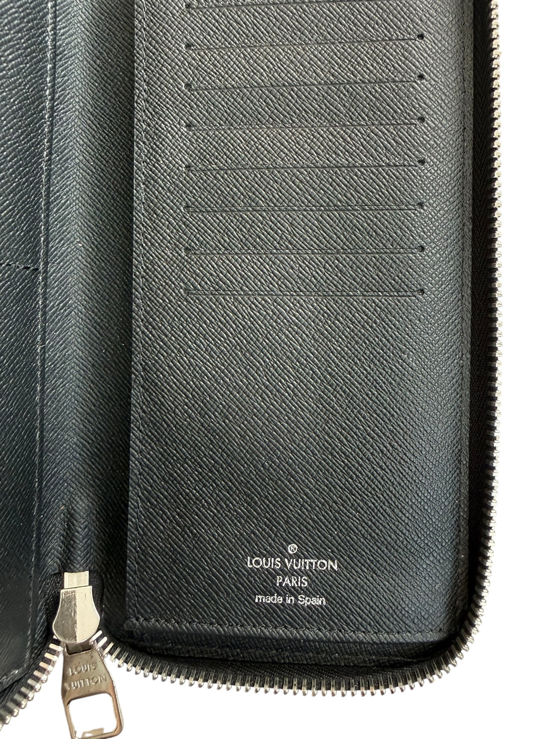 Louis Vuitton Zippy Vertical Wallet in Damier Graphite.