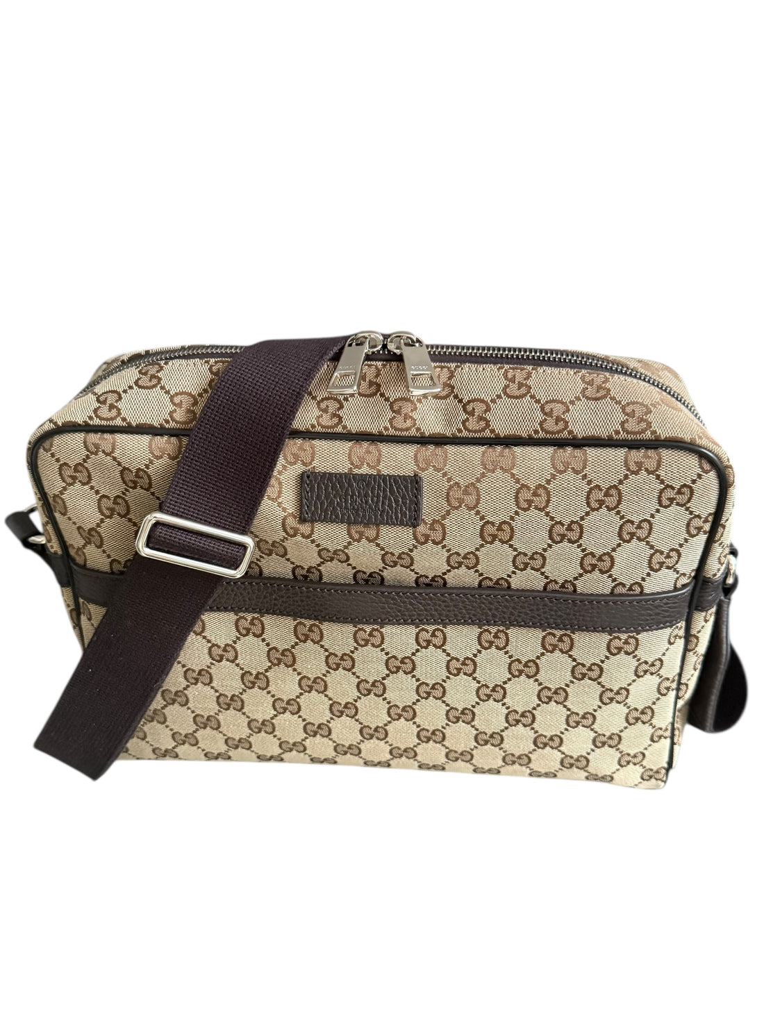 Gucci GG Canvas Messenger Bag.