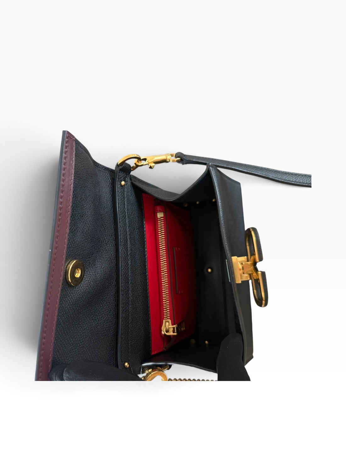 Petit sac à main Valentino Garavani Vsling en cuir de veau grainé noir.