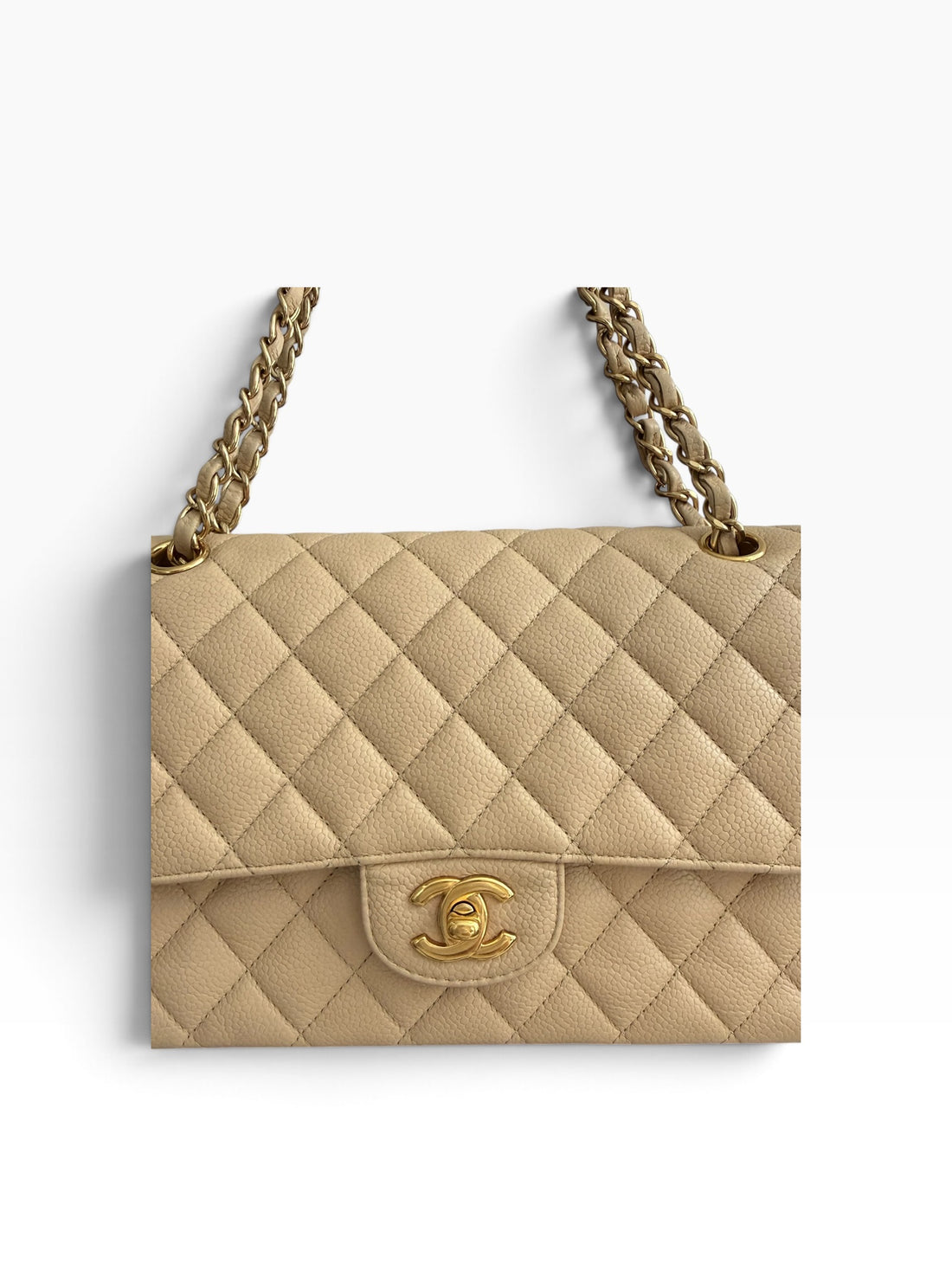 Diese Chanel Classic Medium Double Flap Bag ist aus beigem Kaviarleder gefertigt und verfügt über eine charakteristische Rautensteppung.