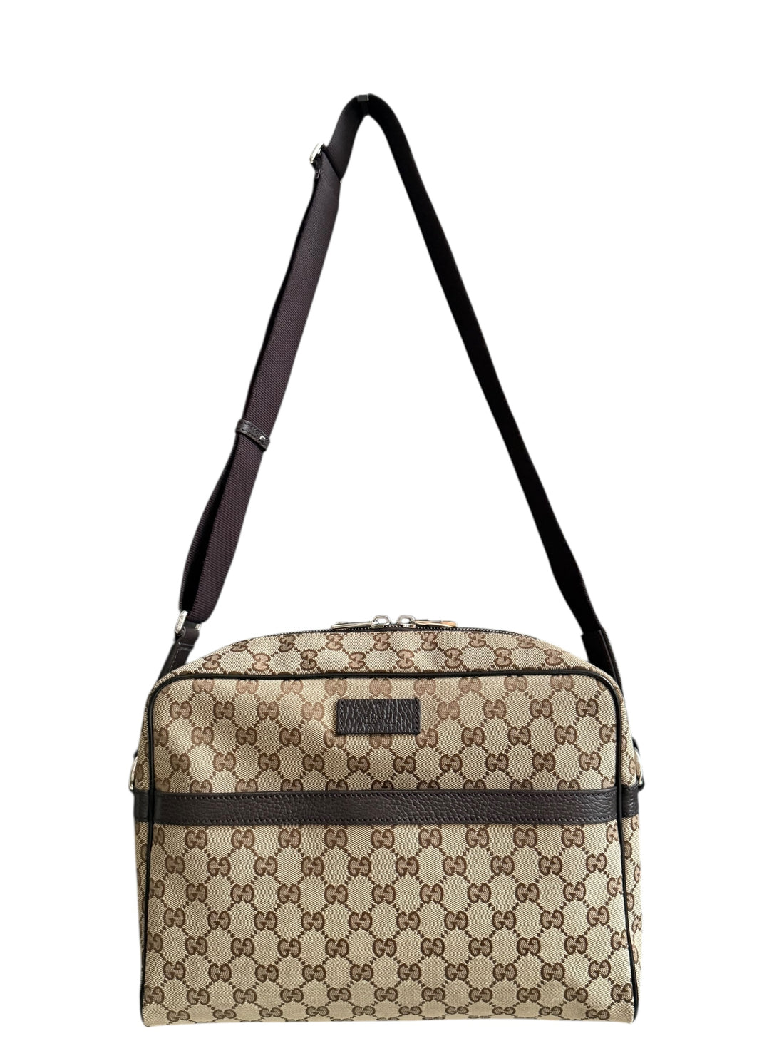 Gucci GG Canvas Messenger Bag.