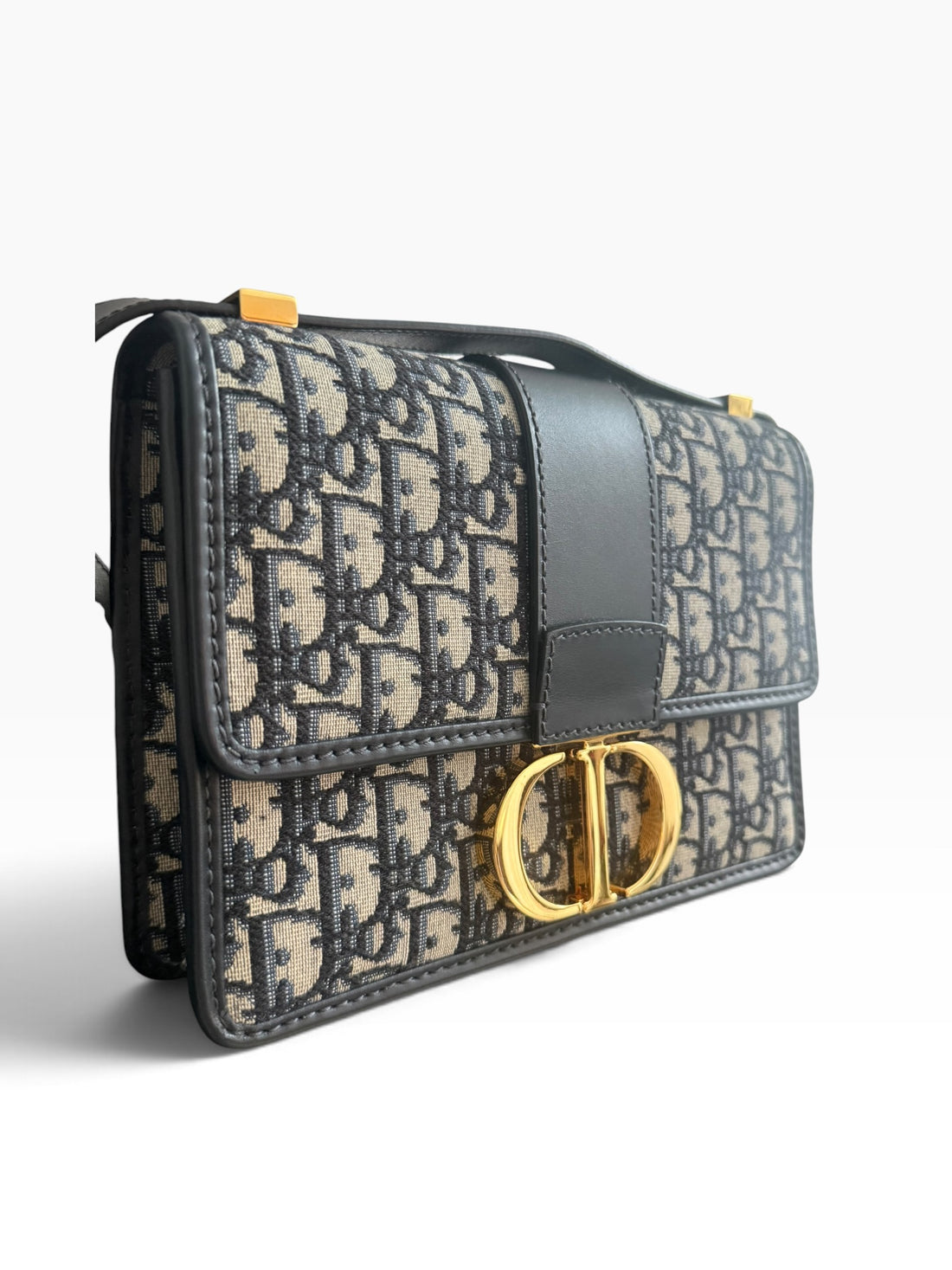 Sac 30 Montaigne Christian Dior en jacquard Oblique bleu.