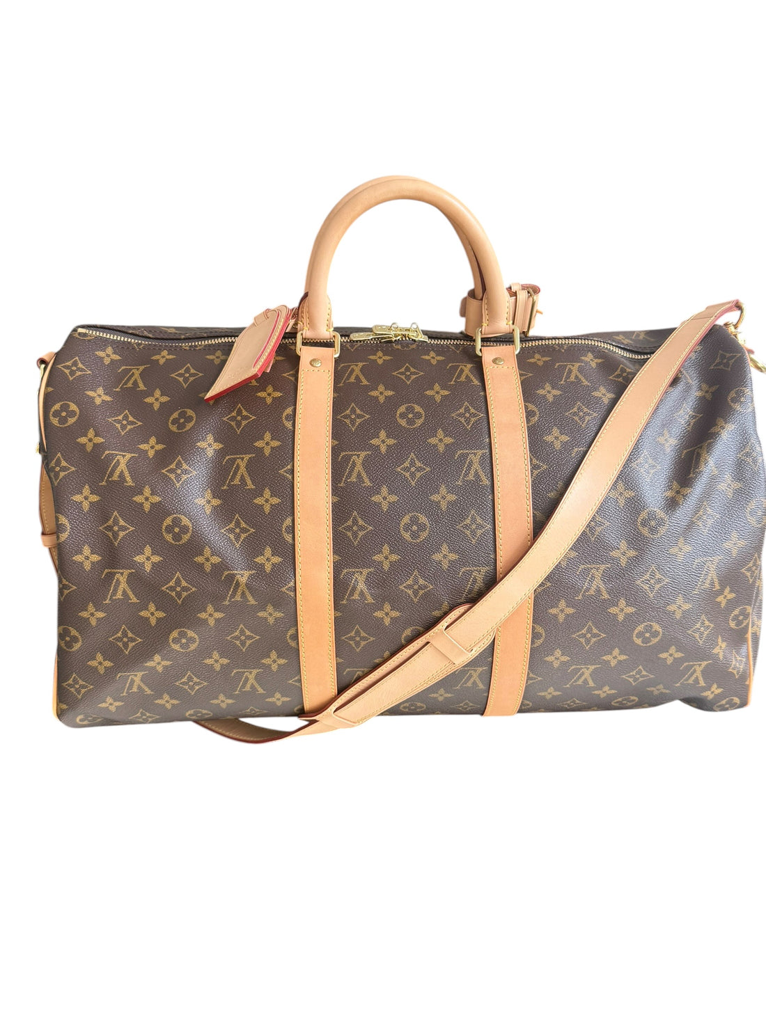 Louis Vuitton Keepall 50 Monogram Canvas mit abnehm- und verstellbarem Schulterriemen.