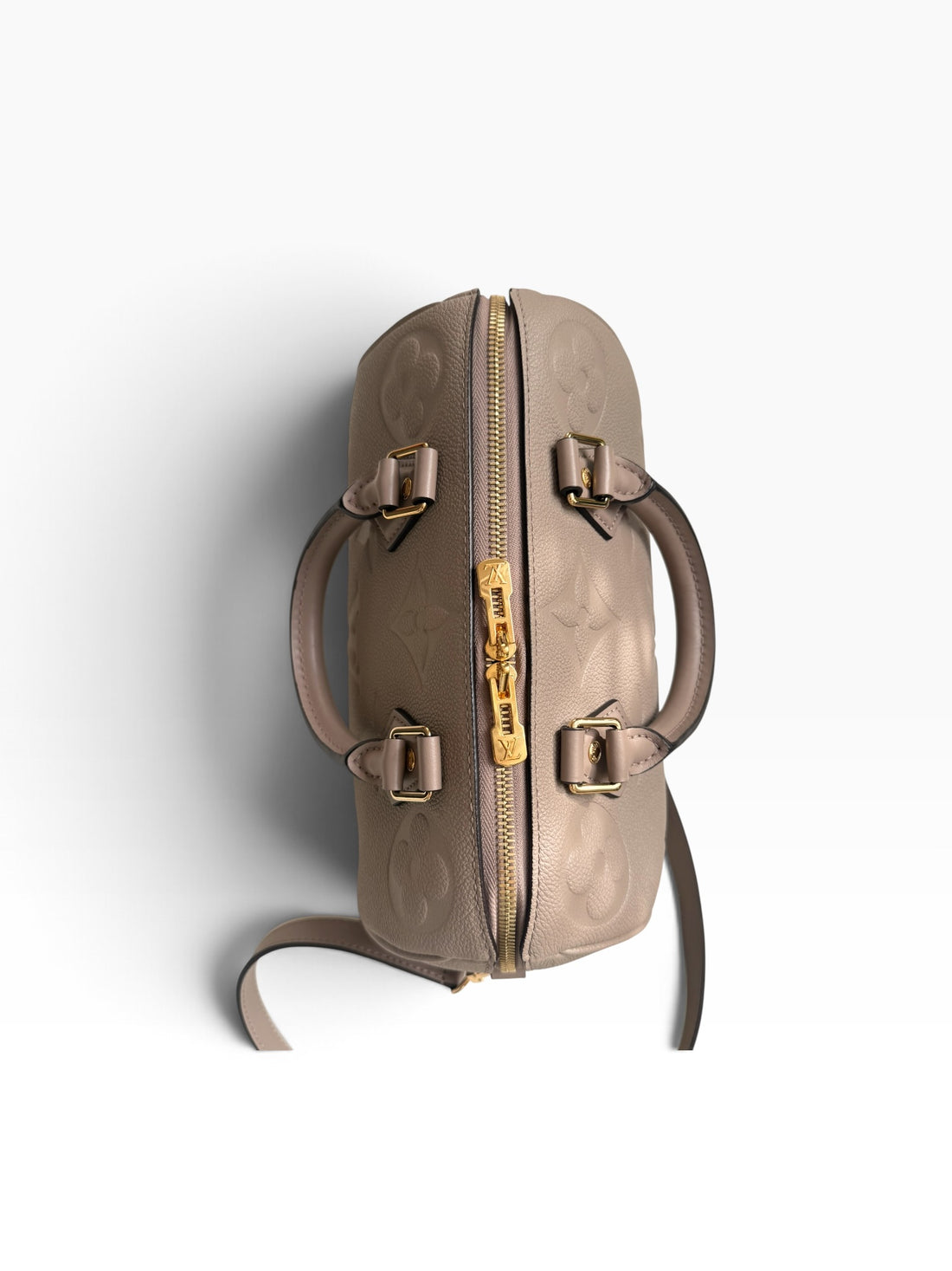 Louis Vuitton Speedy 25 in genarbtem Monogram Empreinte Leder mit einem übergrossen Monogram-Motiv.