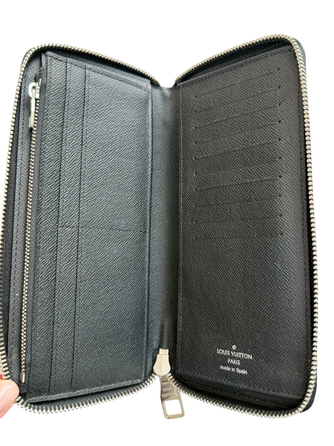Louis Vuitton Zippy Vertical Wallet in Damier Graphite.