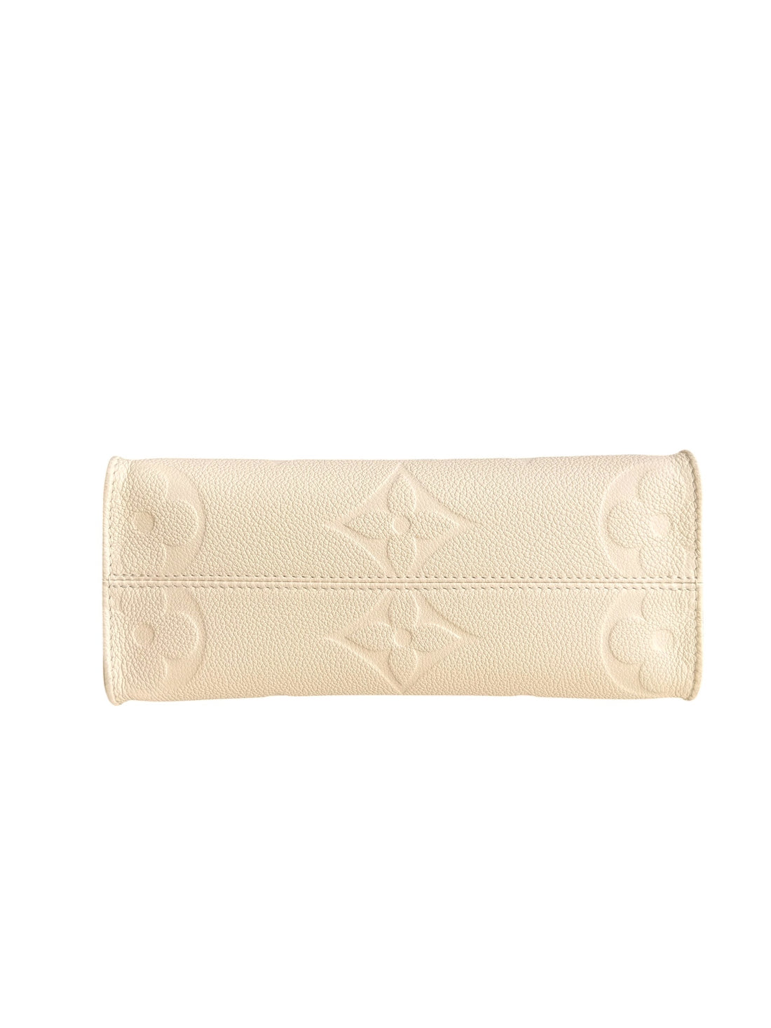 Louis Vuitton On-The-Go PM in Monogram Empreinte Leder in der Farbe creme mit abnehmbaren und verstellbaren Schulterriemen.