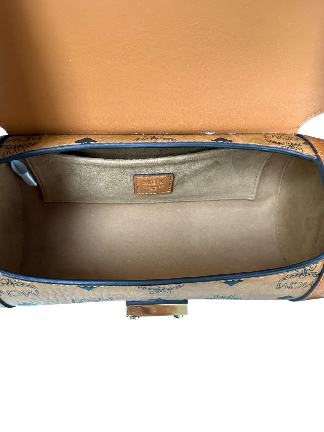 MCM Small Tracy Visetos Zylinder-Umhängetasche in Cognac-braunem beschichtetem Canvas und Leder.