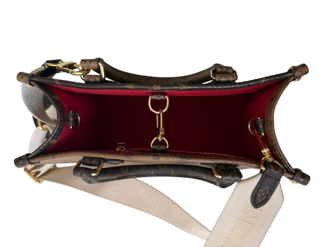 Louis Vuitton On-The-Go pm in Monogram Canvas Reverse mit abnehm- und verstellbarem breitem Schulterriemen mit Coin.