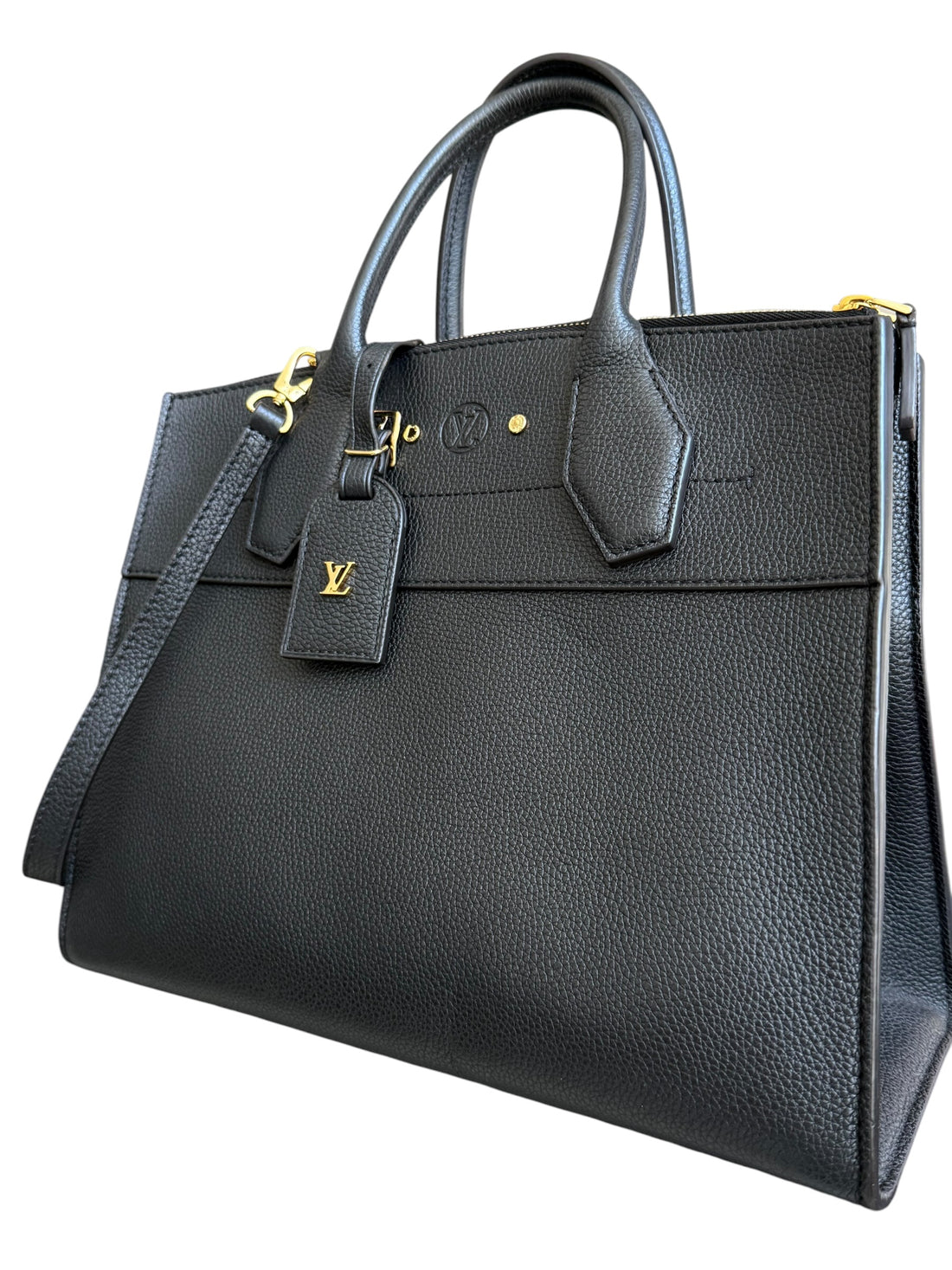Louis Vuitton City Steamer MM Handtasche aus schwarzem genarbtem Taurillon Kalbsleder mit goldfarbenen Metalldetails und dem charakteristischen Vorhängeschloss.